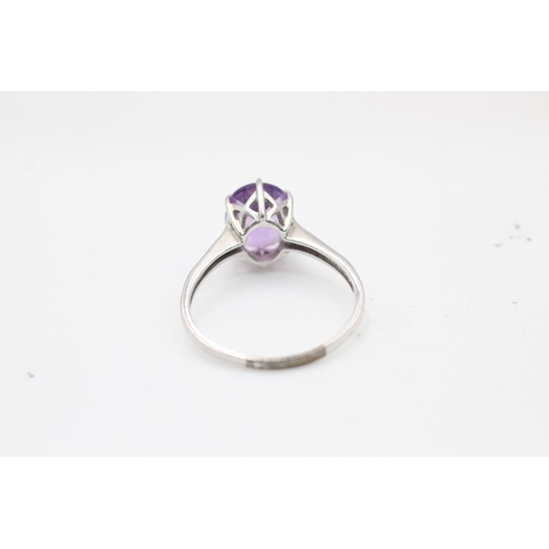 116 - A 9ct white gold amethyst and diamond dress ring, size V - approx. gross weight 3.3 grams