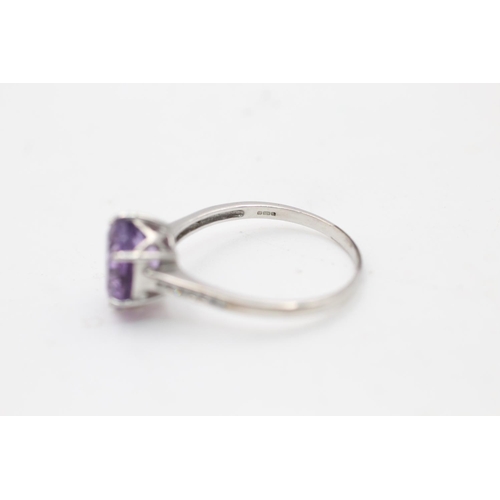 116 - A 9ct white gold amethyst and diamond dress ring, size V - approx. gross weight 3.3 grams