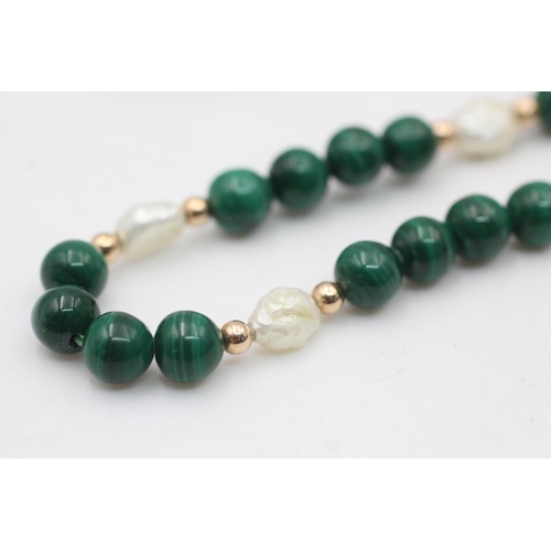 117 - A 14ct gold clasped cultured pearl and malachite bead necklace - approx. gross weight 24 grams