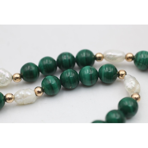 117 - A 14ct gold clasped cultured pearl and malachite bead necklace - approx. gross weight 24 grams