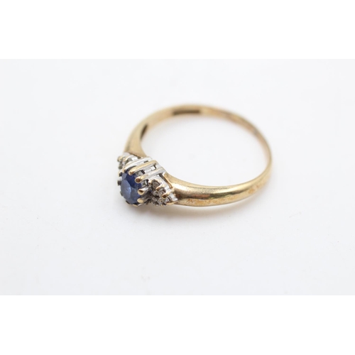 118 - A 9ct gold diamond and sapphire dress ring, size P - approx. gross weight 1.9 grams