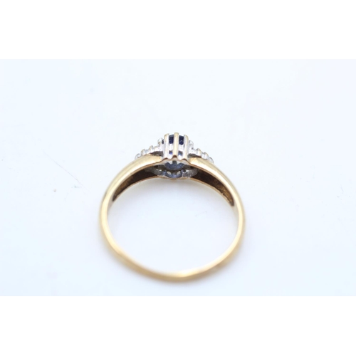 118 - A 9ct gold diamond and sapphire dress ring, size P - approx. gross weight 1.9 grams