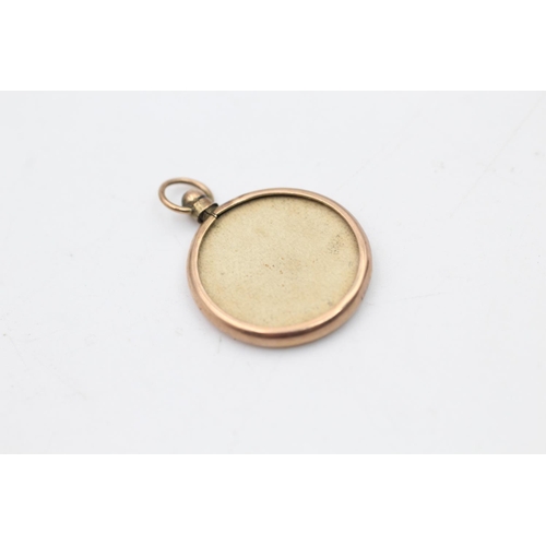 122 - A hallmarked Birmingham 9ct gold antique double sided photo pendant, dated 1854 - approx. gross weig... 