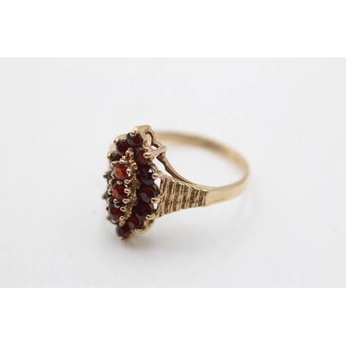 123 - A hallmarked Birmingham 9ct gold vintage garnet navette ring, size P - approx. gross weight 3 grams