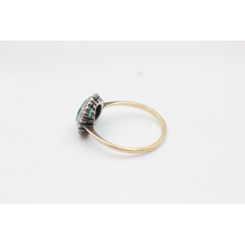 129 - A 9ct gold and silver setting green and clear paste halo dress ring, size O½ - approx. gross weight ... 