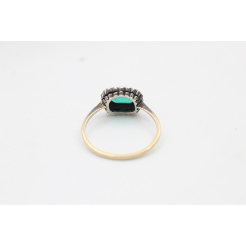 129 - A 9ct gold and silver setting green and clear paste halo dress ring, size O½ - approx. gross weight ... 