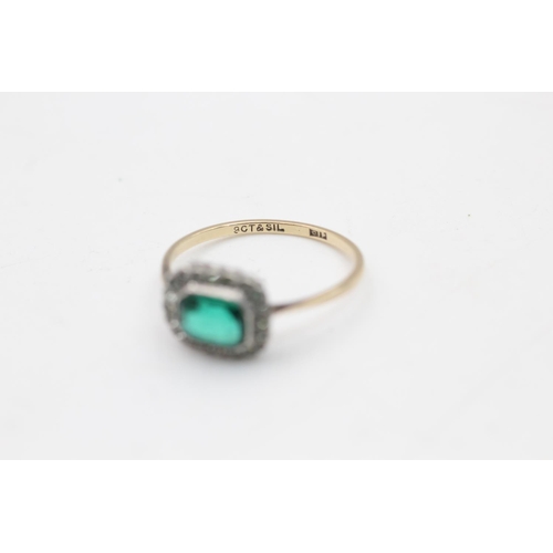 129 - A 9ct gold and silver setting green and clear paste halo dress ring, size O½ - approx. gross weight ... 