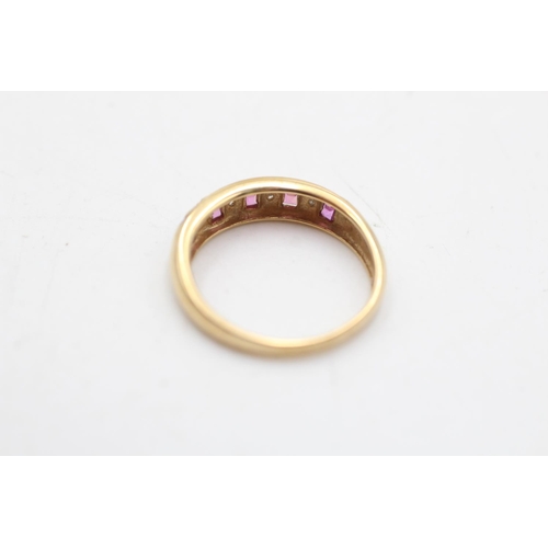 13 - A 9ct gold ruby and diamond dress ring, size N - approx. gross weight 1.7 grams