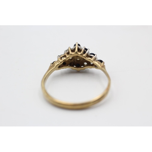 51 - A hallmarked Birmingham 9ct gold diamond and sapphire dress ring, size O - approx. gross weight 1.9 ... 