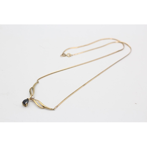 52 - A 9ct gold diamond and sapphire drop static pendant necklace - approx. gross weight 3.4 grams