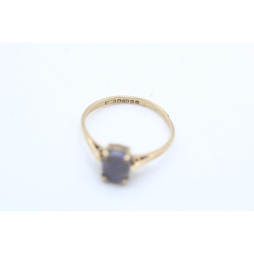 58 - A hallmarked Birmingham 9ct gold opal solitaire ring, size T - approx. gross weight 1.6 grams