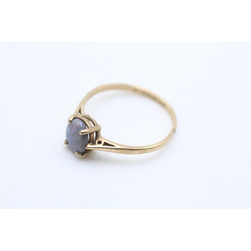 58 - A hallmarked Birmingham 9ct gold opal solitaire ring, size T - approx. gross weight 1.6 grams