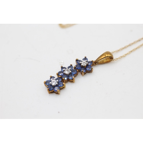 73 - A 9ct gold blue and white sapphire floral design pendant necklace - approx. gross weight 1.5 grams