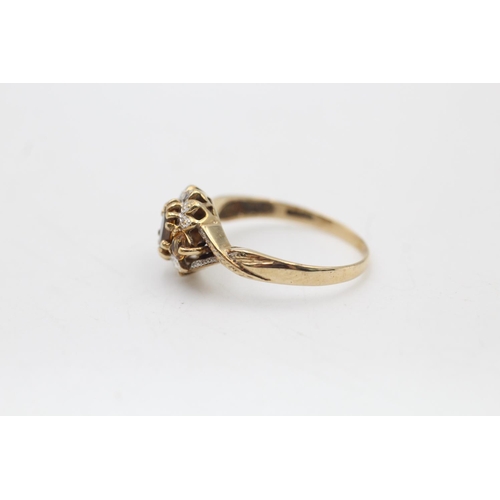 88 - A 9ct gold citrine and diamond cluster ornate dress ring, size Q½ - approx. gross weight 2.4 grams