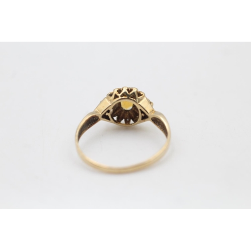 88 - A 9ct gold citrine and diamond cluster ornate dress ring, size Q½ - approx. gross weight 2.4 grams