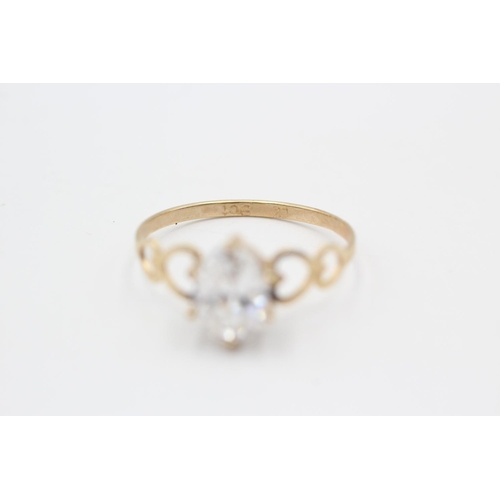 92 - A 9ct gold clear gemstone solitaire ring with openwork heart shoulders, size P½ - approx. gross weig... 