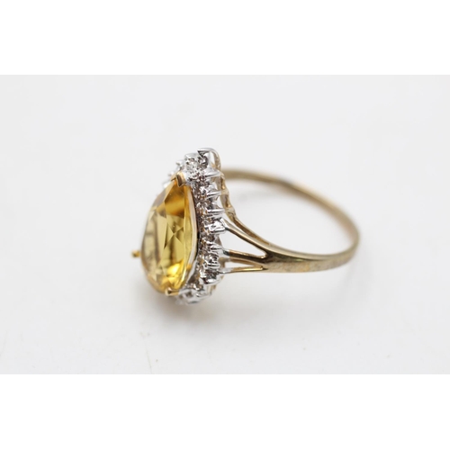 93 - A 9ct gold citrine and diamond tear shape cocktail ring, size R - approx. gross weight 3.3 grams