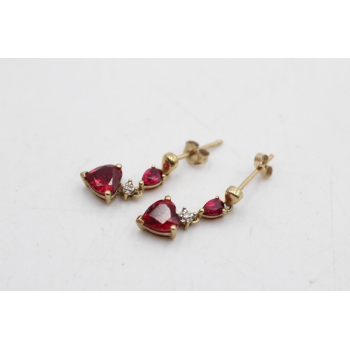 95 - Two pairs of 9ct gold and garnet heart drop earrings, one with diamonds - approx. gross weight 3.3 g... 