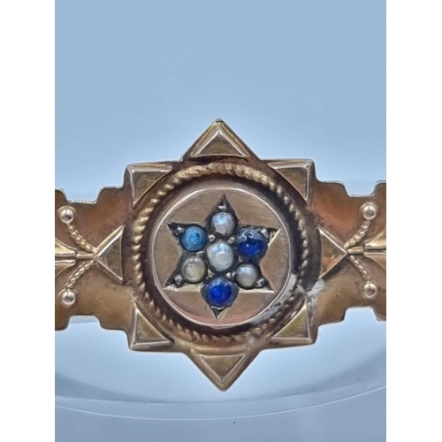 158 - A Victorian hallmarked Chester 9ct gold seed pearl and blue gemstone pin brooch, dated 1897 - approx... 