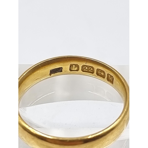 165 - A George V hallmarked Birmingham 22ct gold wedding band, dated 1921, size L½ - approx. gross weight ... 