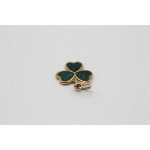 2 - A hallmarked Birmingham 9ct gold green enamel shamrock pendant - approx. gross weight 1 gram