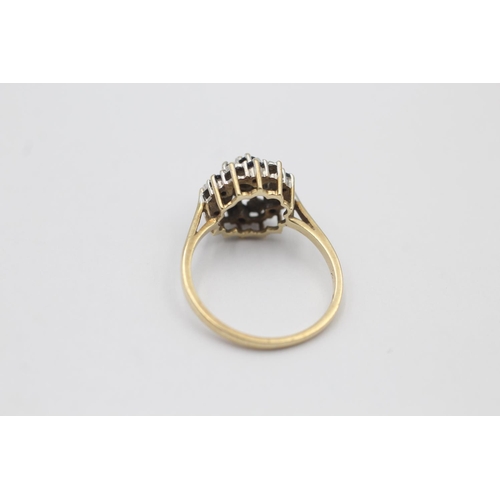 20 - A hallmarked Birmingham 9ct gold diamond and sapphire dress ring, size N½ - approx. gross weight 2.5... 