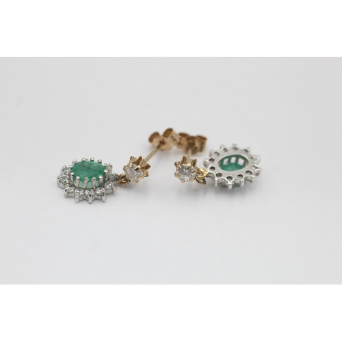 3 - A pair of 9ct yellow and white gold emerald and clear gemstone halo drop earrings - approx. gross we... 