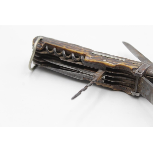 107 - A vintage multi-tool horseman's pocket knife