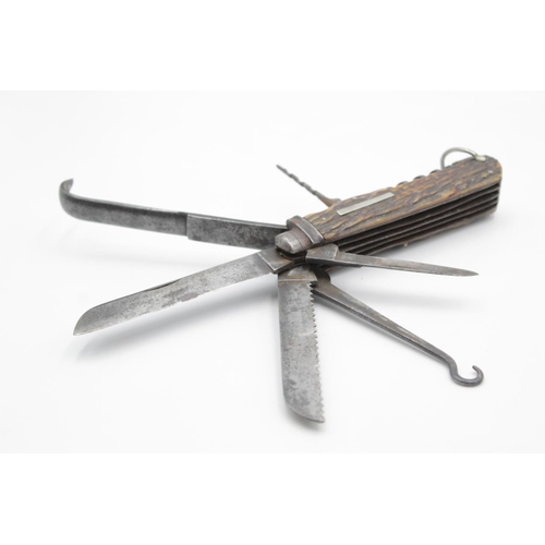 107 - A vintage multi-tool horseman's pocket knife