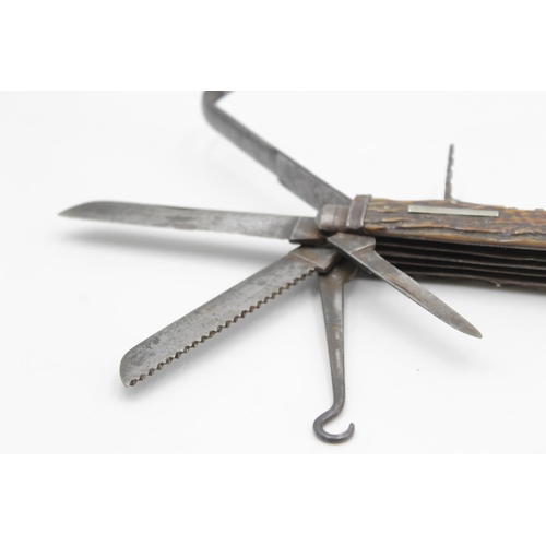 107 - A vintage multi-tool horseman's pocket knife