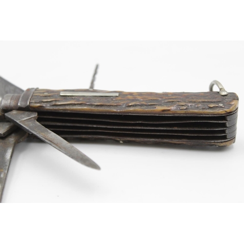 107 - A vintage multi-tool horseman's pocket knife