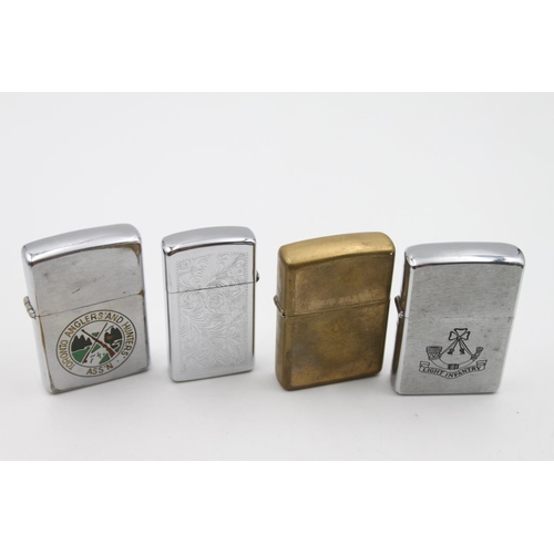 228 - Four assorted Zippo cigarette lighters