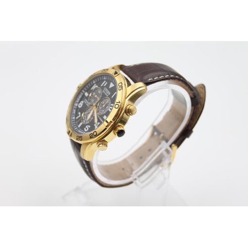 63 - A gent's Citizen Eco-Drive chronograph perpetual calendar light powered wristwatch