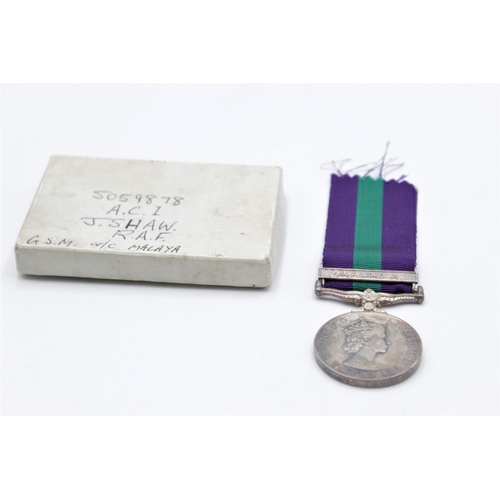 82 - A boxed Elizabeth II General Service Malaya medal presented to 5059878 A.C.I. J. Shaw R.A.F. with ri... 