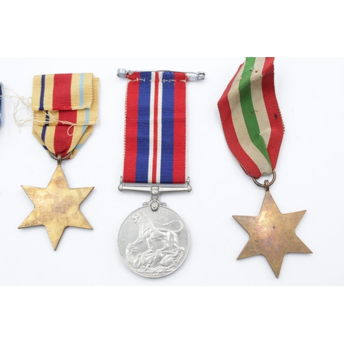 83 - Five WWII medals, one Africa Star, one Italy Star, one 1939-1945 Star, one Defence and one War