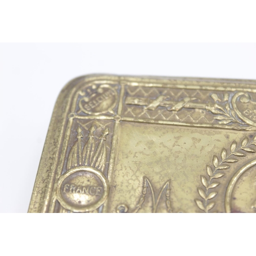 92 - An antique WWI brass Princess Mary Christmas tin with Peace medal - approx. 13cm x 8.5cm