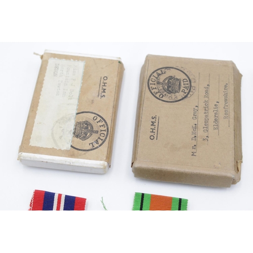 94 - Three boxed WWII medal sets to include Defence and War