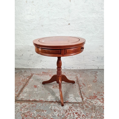 1121 - A Regency style mahogany drum table - approx. 63cm high x 53cm diameter