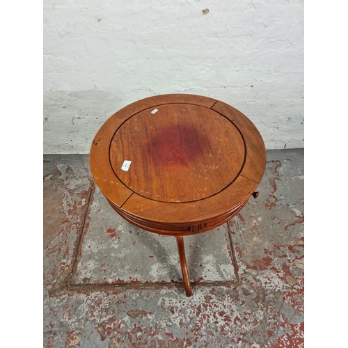 1121 - A Regency style mahogany drum table - approx. 63cm high x 53cm diameter