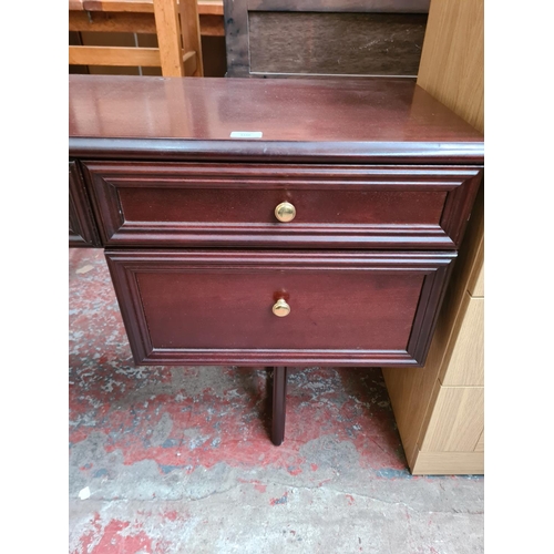 A Rossmore Furniture mahogany five drawer dressing table approx. 74cm