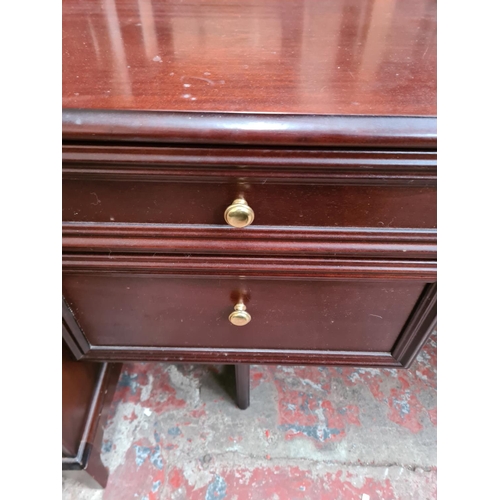 A Rossmore Furniture mahogany five drawer dressing table approx. 74cm