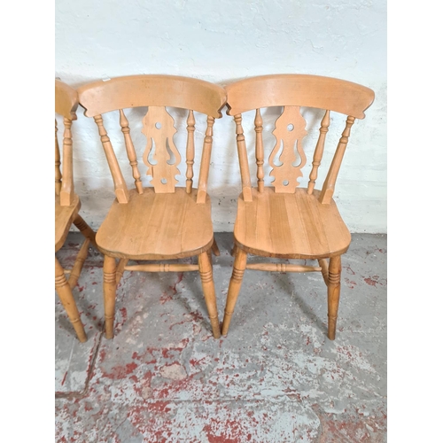 1117 - A set of four Victorian style solid beech farmhouse dining chairs