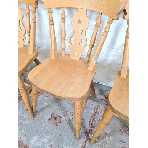 1117 - A set of four Victorian style solid beech farmhouse dining chairs