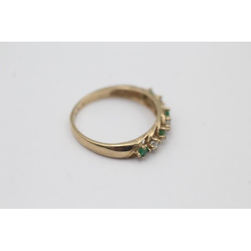 9 - A hallmarked London 9ct gold emerald and clear gemstone seven stone ring, size O½ - approx. gross we... 