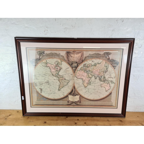 1280 - A framed reproduction map of the world titled 