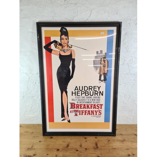 1283 - A framed Audrey Hepburn Breakfast at Tiffany's poster print - approx. 96cm high x 67cm wide