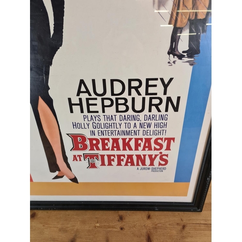 1283 - A framed Audrey Hepburn Breakfast at Tiffany's poster print - approx. 96cm high x 67cm wide