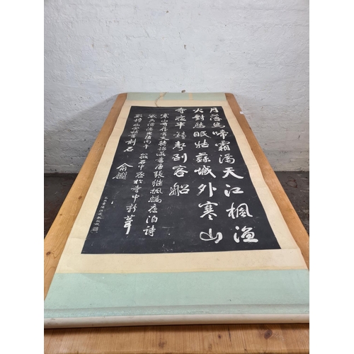 1288 - A boxed Chinese calligraphy rubbing on scroll - approx. 175cm high x 83cm wide