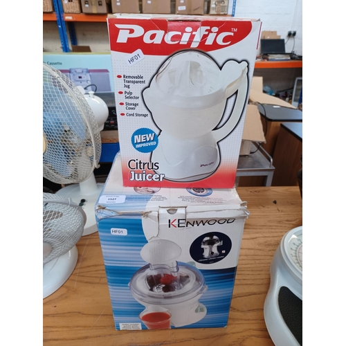 Two boxed items, one Pacific citrus juicer and one Kenwood JE356