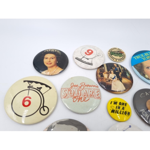 120B - A collection of assorted vintage pin badges to include 